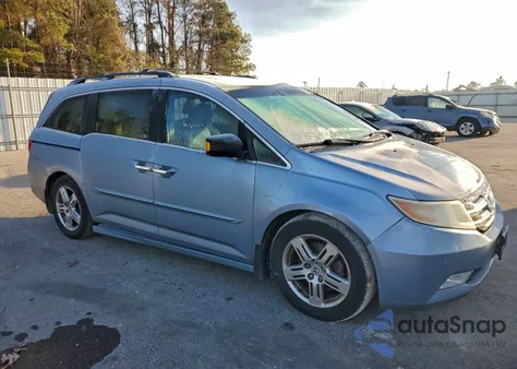 2012 Honda Odyssey Touring z USA, uszkodzony, nr VIN 5FNRL5H95CB088273